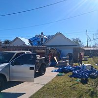 Professional residential roofers at work
